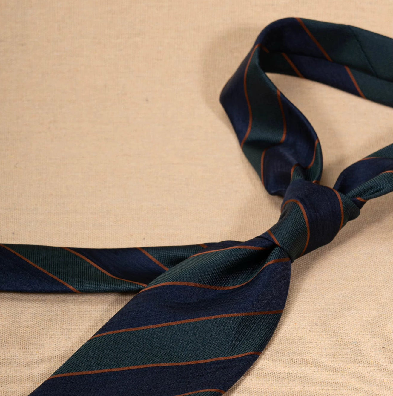 THE REGIMENTAL GREEN AND NAVY STRIPED TIE